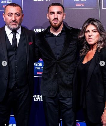 Orkun Kokcu with his parents Halis Kokcu and Sibel Kokcu